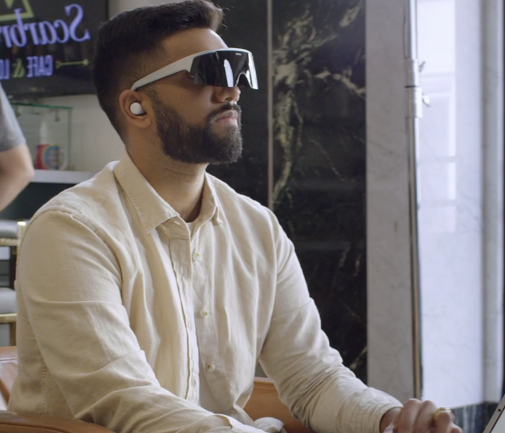 Man wearing VR headset in office